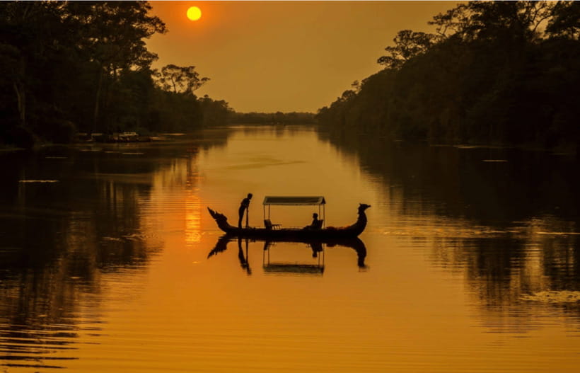 Siem Reap: Angkor Sunset Bike & Boat Tour /E-Bike Available - Dragon boat cruise on an ancient waterway with snacks, beer, and sunset views