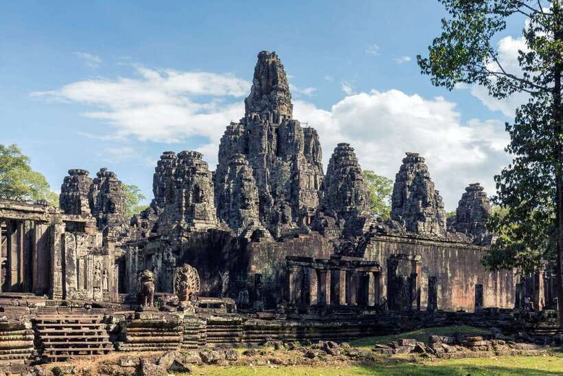 Siem Reap: Angkor Wat Small-Group Full Day Tour and Sunset - First Stop: Angkor Thom and Bayon’s Stone Faces