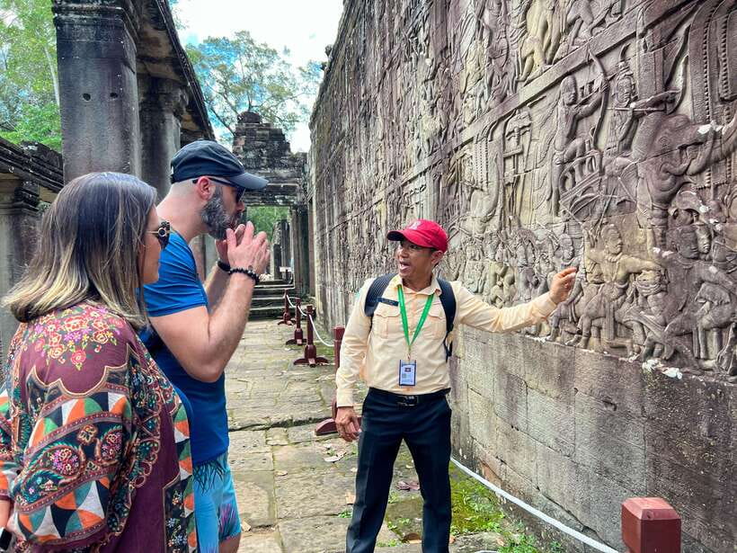 Siem Reap: Angkor Wat Sunrise and Market Tour by Jeep - Ta Prohm and Ta Nei, where jungle takes over the stone
