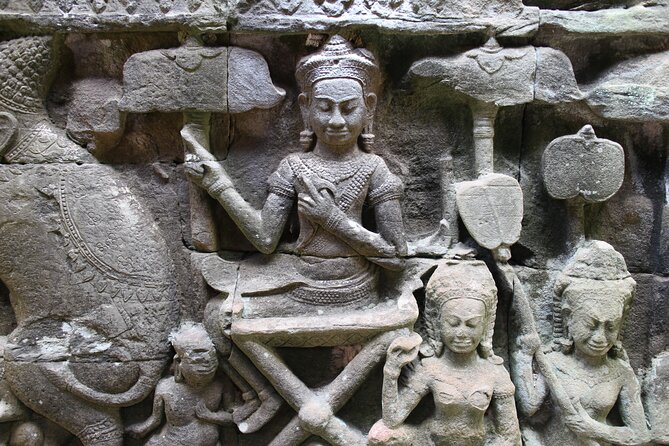 Siem Reap: Bike the Angkor Temples - Full-Day 30km Tour - Bayon and Angkor Thom: smiling faces, stone gates, and a midday reset