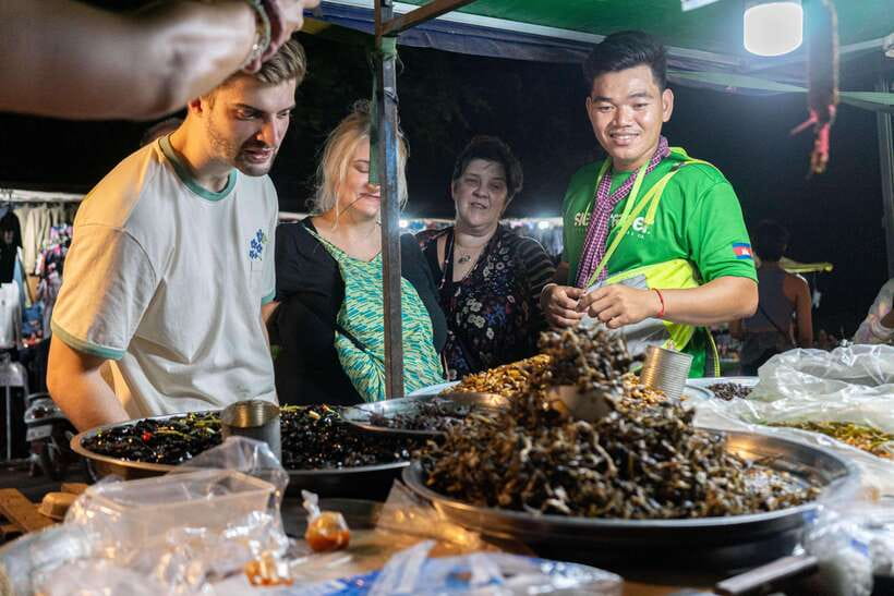 Siem Reap: Evening Food Tour with 10 Local Tastings - Restaurant tastes: spring rolls, tofu, BBQ snails, and the value of ordering with a local