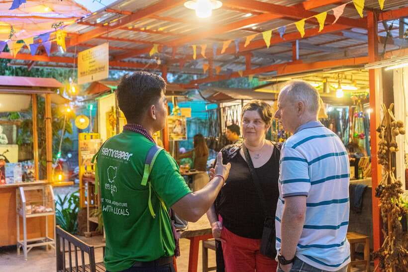 Siem Reap: Evening Food Tour with 10 Local Tastings - Street 60 and the night market: barbecued chicken, cold drinks, and the bug tasting moment