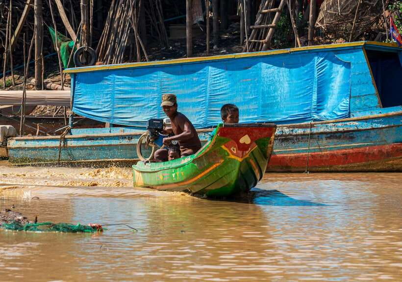 Siem Reap Floating Village Kampong Phluk Sunset with Boat - Kampong Phluk on foot: stilts, school, and the rhythm of a village