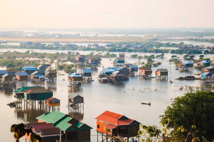 Siem Reap: Half-Day Kampong Phluk with Sunset, Boat & Guide - Season Matters: Dry Season Stilts vs Rainy Season Watery Wonderland