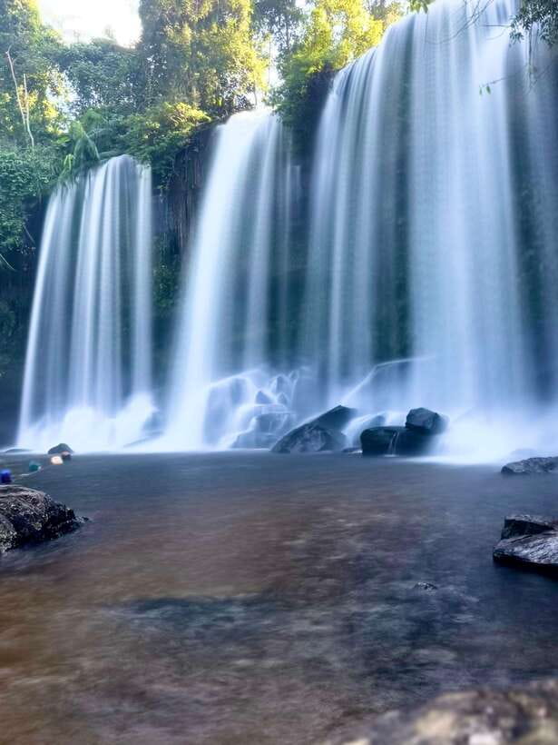 Siem Reap: Kulen Waterfall and Banteay Srei Exploration - Preah Dak village: steamed palm cakes and a solar light project