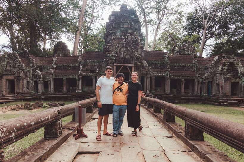 Siem Reap Sunrise Angkor Wat Temple Tour - Bayon Temple: face towers and a guide who helps you read the stone