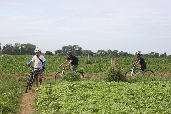 Silk Island Cycling Adventure & lunch with locals - Floating restaurant lunch: cool air, river views, and Khmer food
