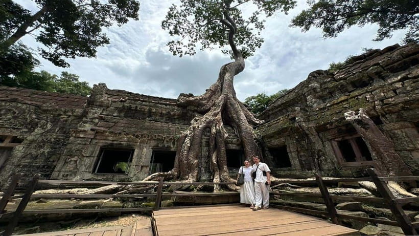Small-Group Explore Angkor Wat Sunrise Tour with Guide - Ta Prohm, the Tomb Raider Temple: roots, rock, and the best way to see it