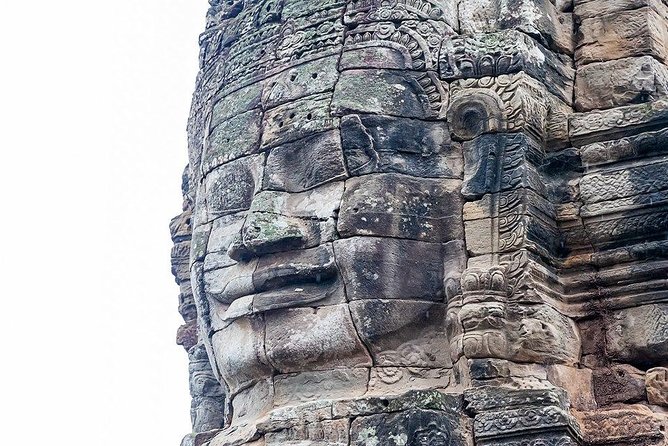 Sunrise Tour of Angkor Temples from Siem Reap - Angkor Thom City and Bayon Temple: Stone Smiles in the Morning