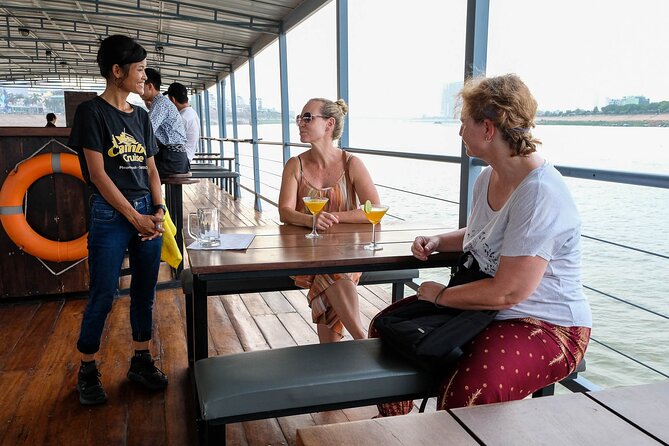Sunset & Evening Dinner Cruise With One Way Free Pick Up - Entering the Phnom Penh River Glow: What This Cruise Really Gives You
