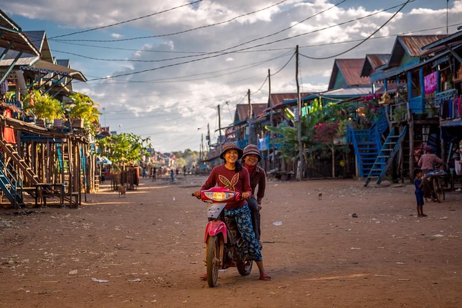 Tonle Sap Lake and Kampong Phluk Village Private Half Day Tour - Stop 2 in Kampong Phluk: stilt homes, schools, and daily routines