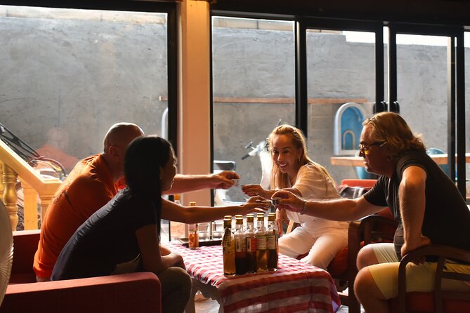 Workshop Visit and Sombai Liqueur Tasting - Snacks and hand-painted souvenirs: how to make it count